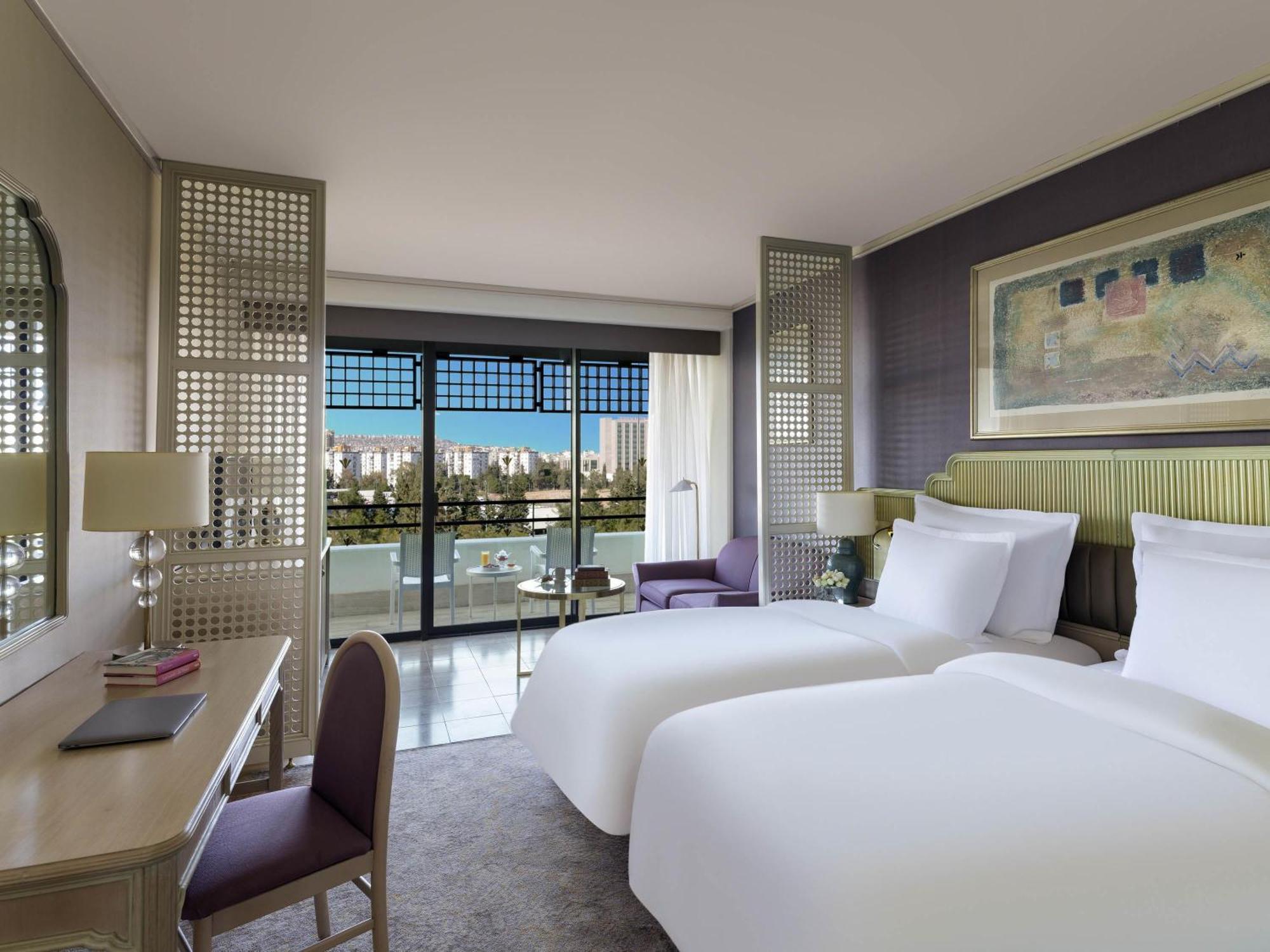 Comfort Twin Room Two Sofa Beds City View